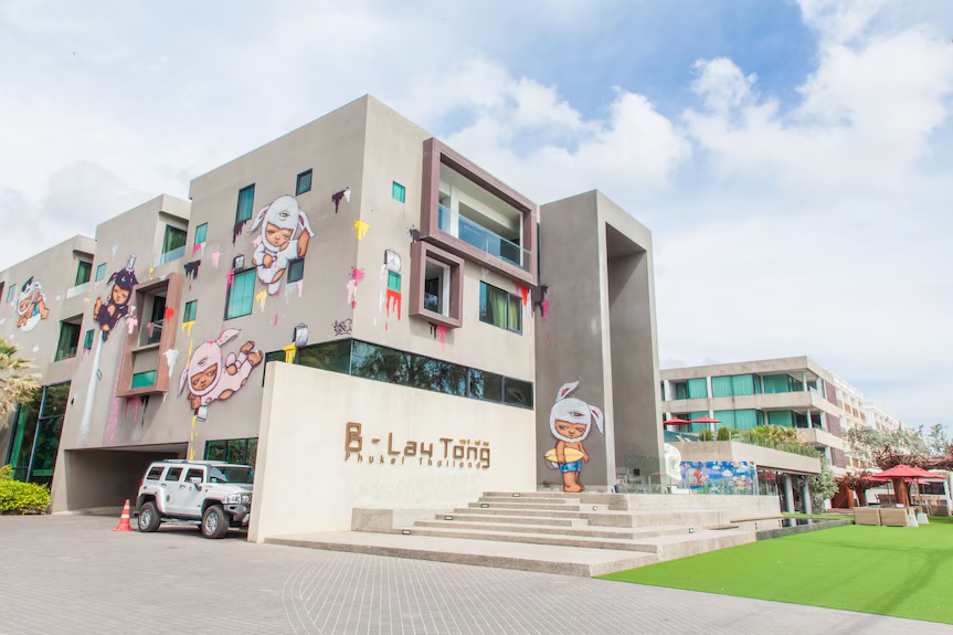 Front of the B-Lay Tong hotel in Patong Beach with painted murals