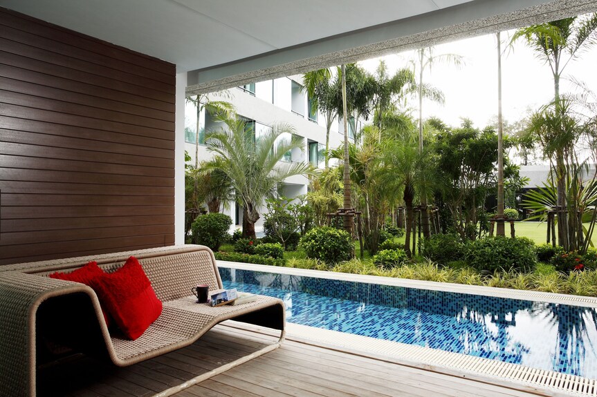 Room deck opening onto its own stretch of pool